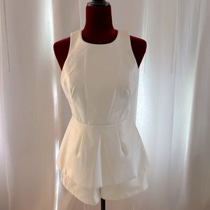 Cameo white romper with slight peplum.
